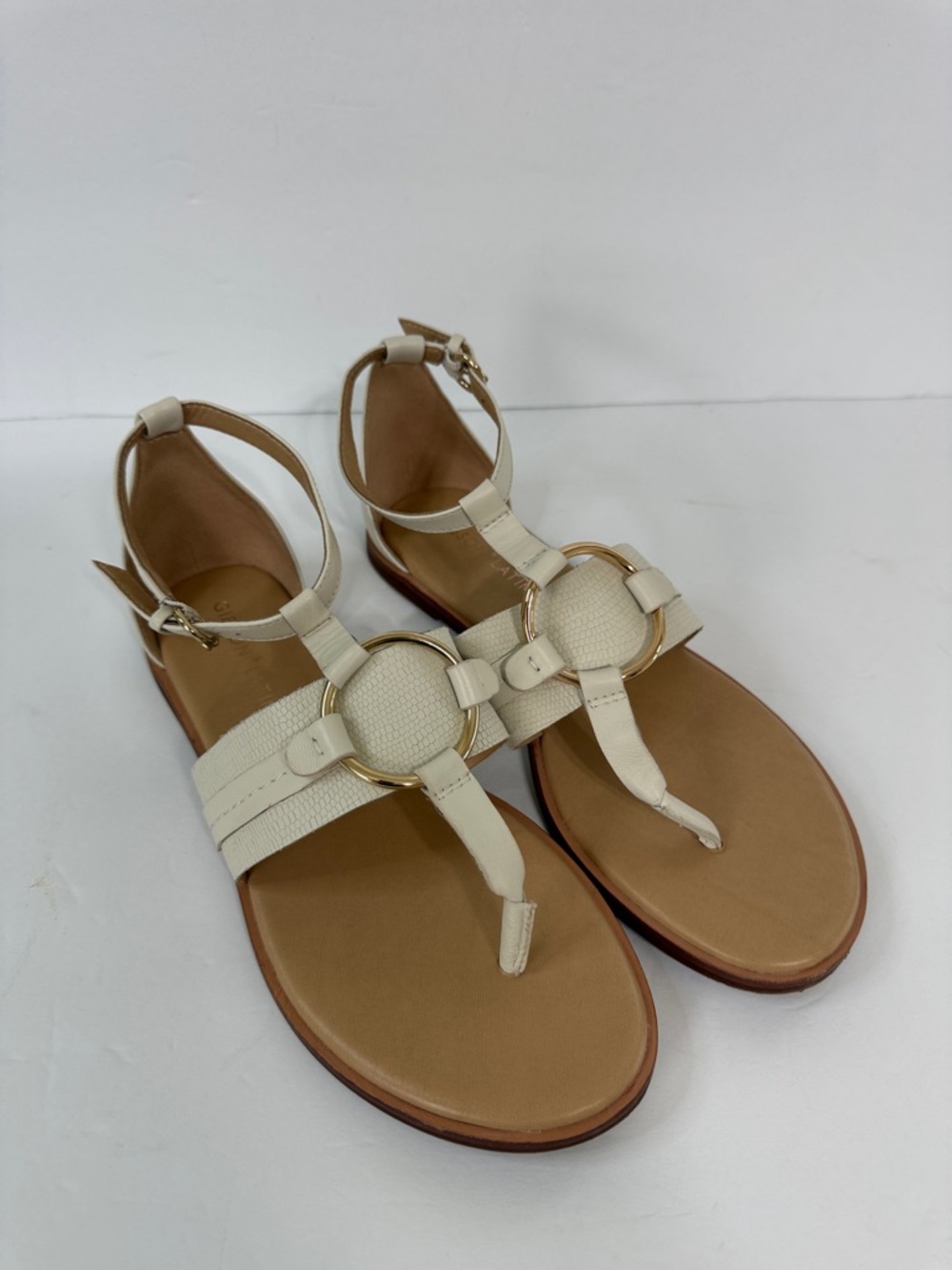 Gibson Latimer Ivory T‑Strap Sandals with Gold Ring Detail